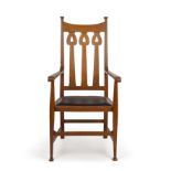 Attributed to Liberty & Co. Arts & Crafts armchair oak with leather seat 120cm high; together with