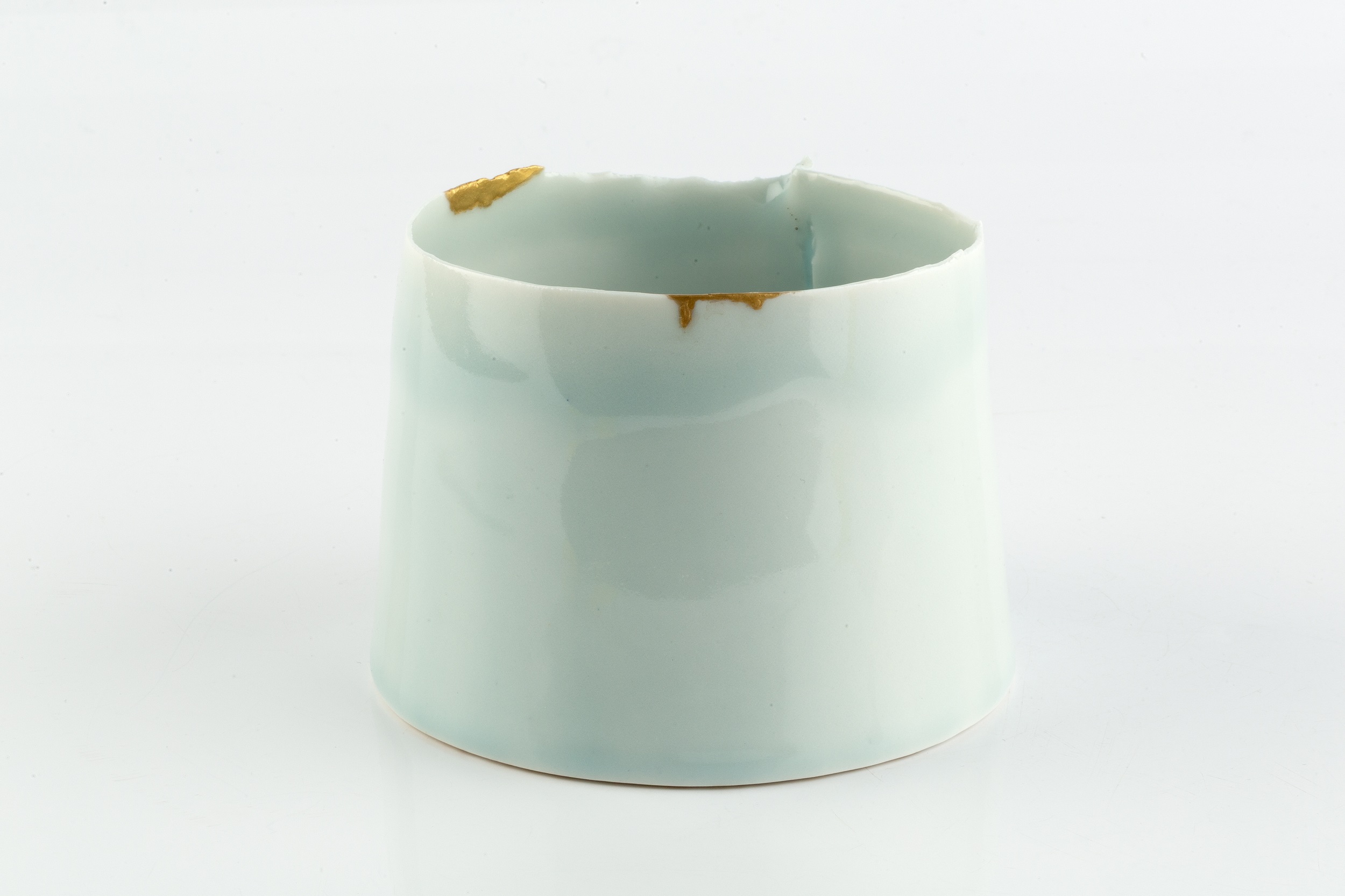 Chun Liao (b.1969) Cylinder porcelain, with a pale celadon glaze signed 10cm high, 11cm diameter. - Image 2 of 3