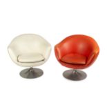Eero Saarinen (1910-1961) Two swivel armchairs red and white upholstery on an aluminium base 70cm