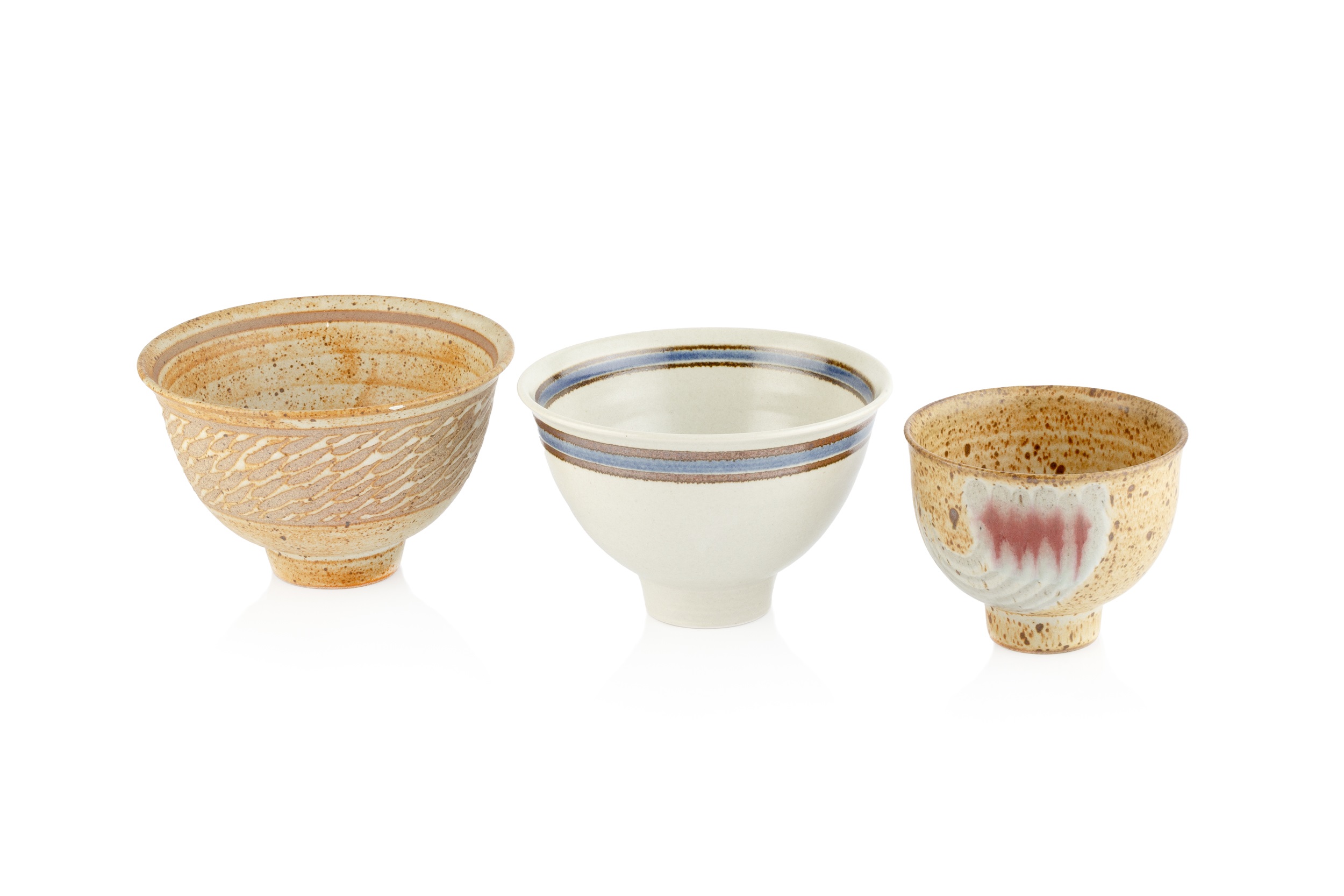 David Lloyd-Jones (1928-1994) Three footed bowl two with oatmeal glaze, the other with white glaze