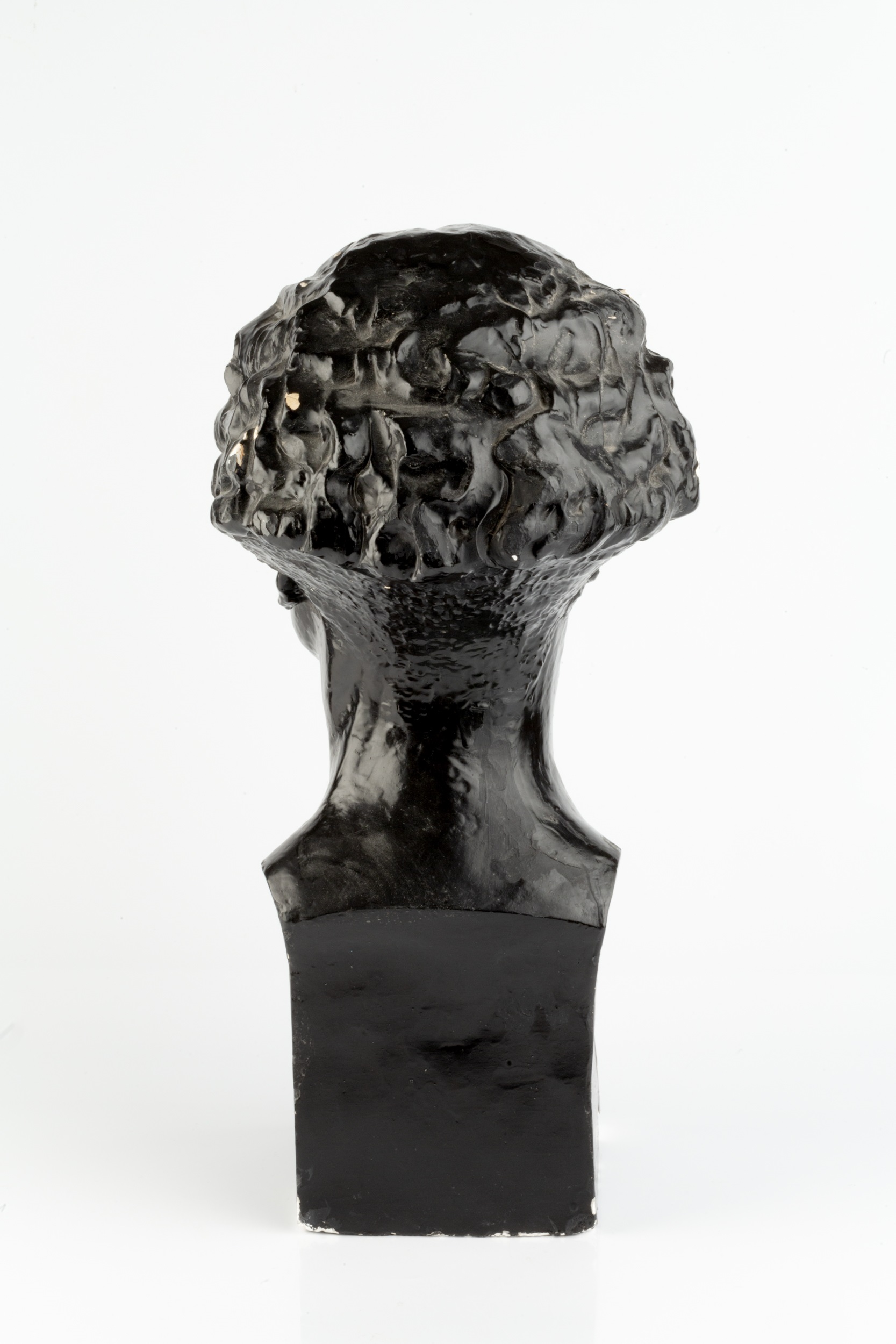 Manner of Jacob Epstein (1880-1959) Portrait bust of a girl, circa 1920 black painted plaster 49cm - Image 3 of 3