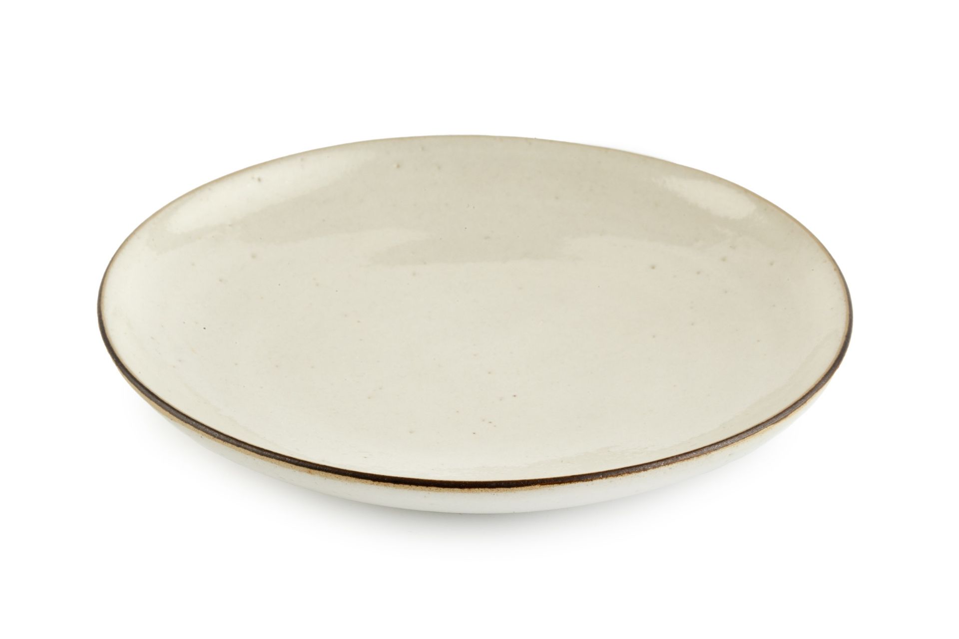 Lucie Rie (1902-1995) Dish cream glaze with manganese rim impressed potter's seal 14cm diameter.