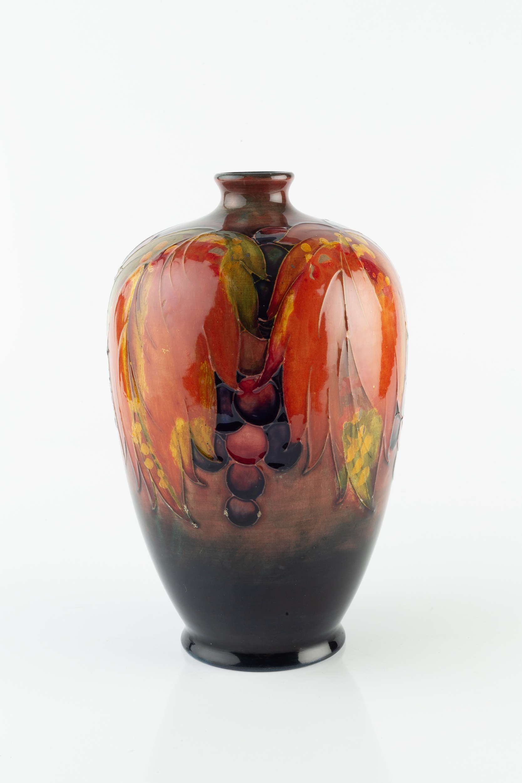 William Moorcroft (1872-1945) Vase leaf and berry pattern signed and with impressed marks 25cm high. - Image 2 of 3