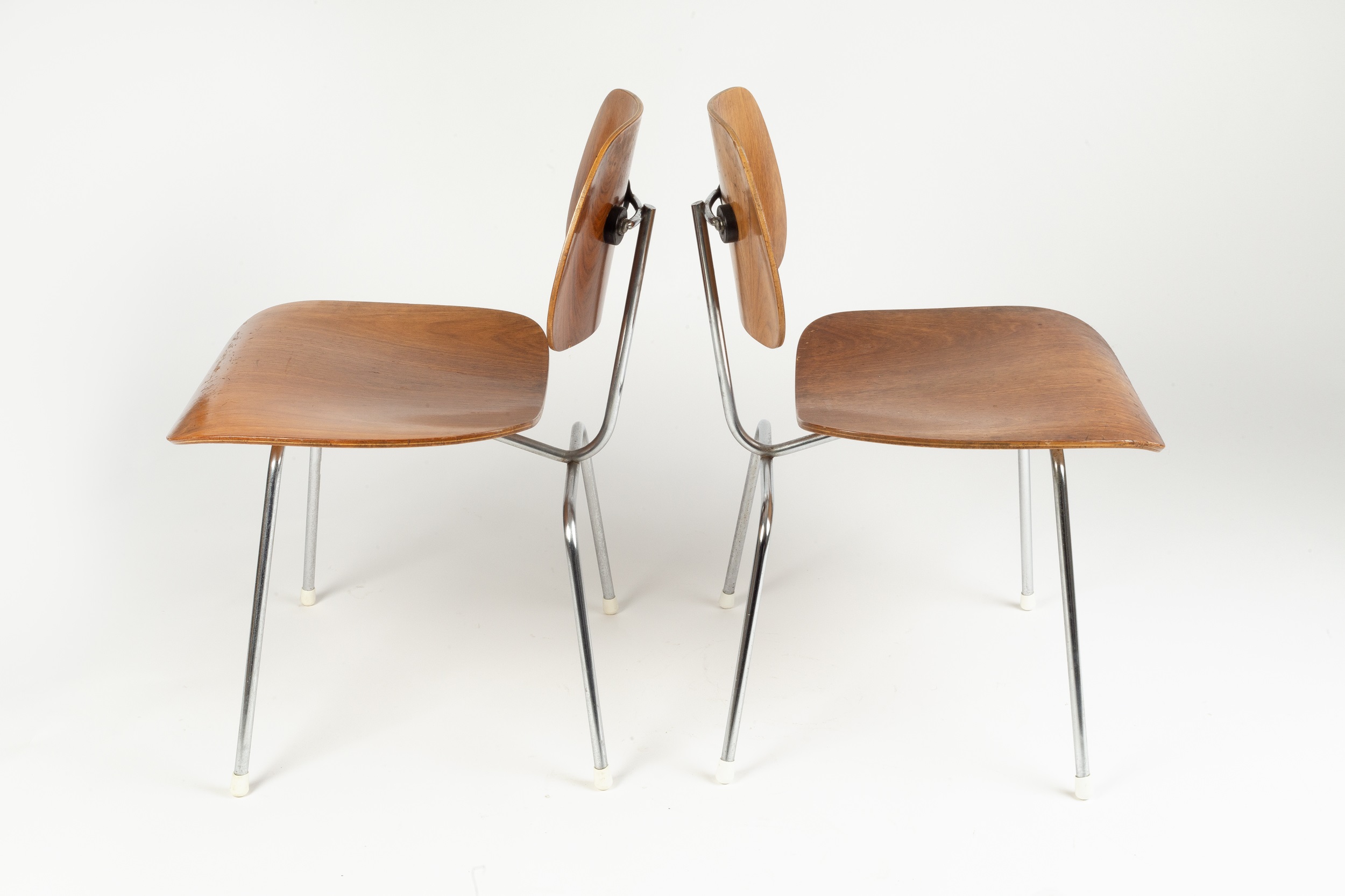 Charles and Ray Eames A pair of DCM side chair, designed in 1946 plywood on chrome frames 68cm high, - Image 2 of 3