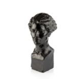 Manner of Jacob Epstein (1880-1959) Portrait bust of a girl, circa 1920 black painted plaster 49cm