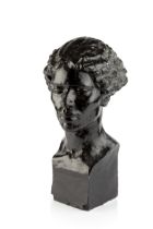 Manner of Jacob Epstein (1880-1959) Portrait bust of a girl, circa 1920 black painted plaster 49cm