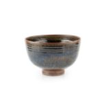 Len Hollman (20th Century) Footed bowl tenmoku impressed potter's seal 15cm high, 23cm diameter.