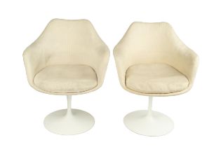 Eero Saarinen (1910-1961) A pair of Tulip chairs with fabric upholstery on white bases 84cm high,