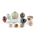 Studio Ceramics To include a Tony Laverick vase, 15cm high; a Margaret Curtis bowl and vase; boxed