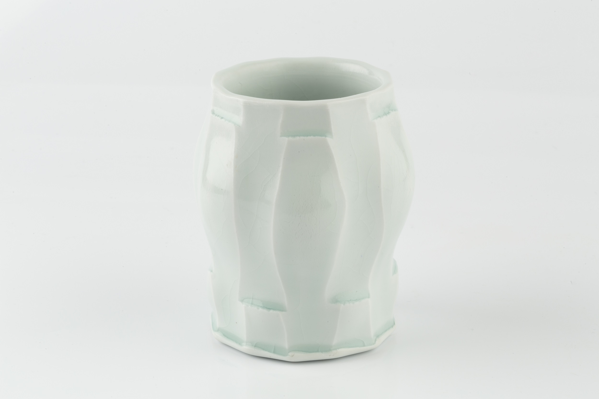 Andy Shaw (20th Century) Vessel faceted porcelain with celadon glaze impressed potter's seal 12cm - Image 2 of 3