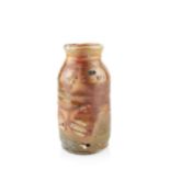 Nic Collins (b.1958) Bottle stoneware, wood-fired signed 19.5cm high. Crazing around rim.  Vase with