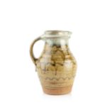 Mike Dodd (b.1943) Large jug stoneware, with green ash glaze impressed potter's seal 27cm high.