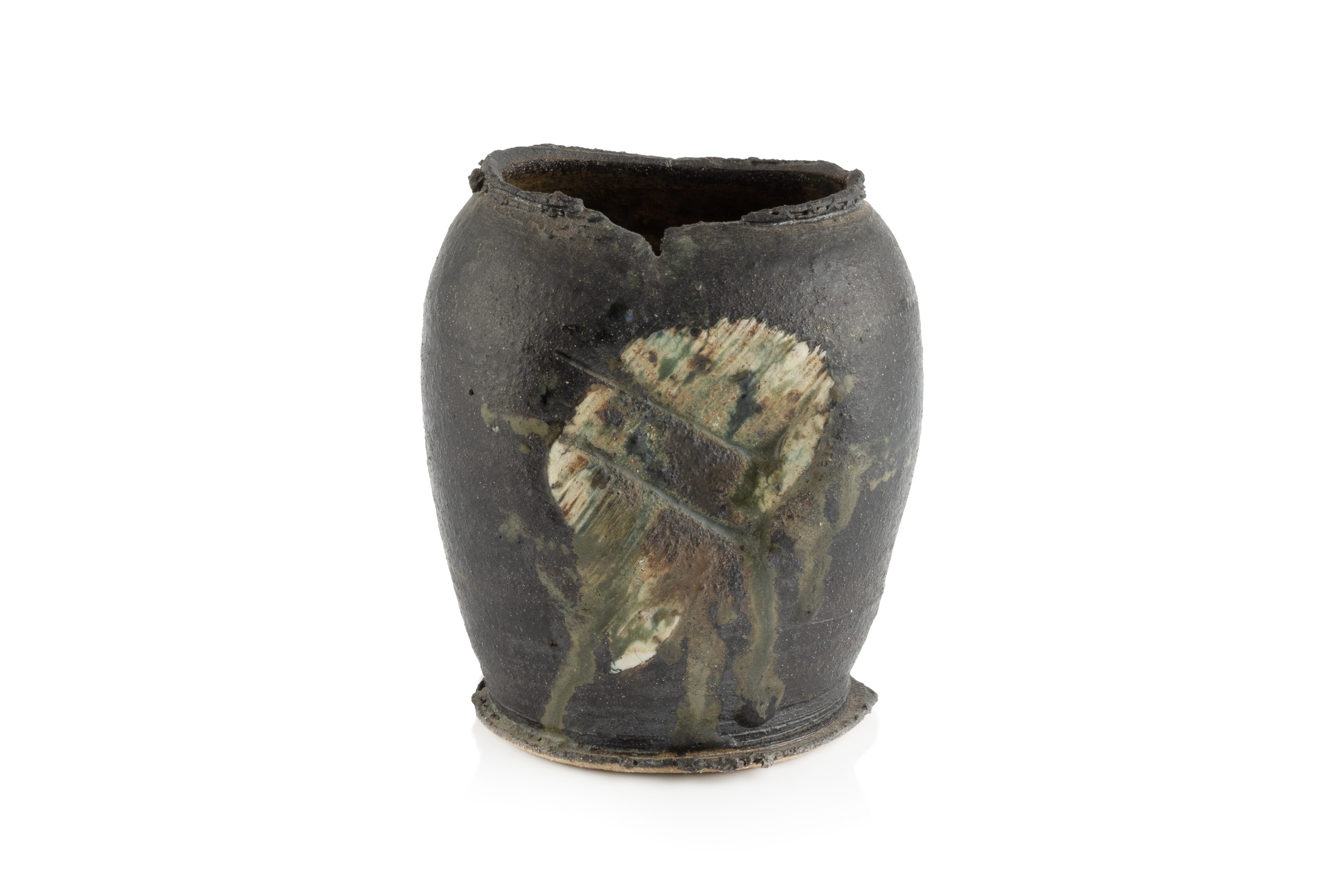 Dan Kelly (b.1953) Vessel stoneware, with black glaze and white and green indentation 12.5cm high.