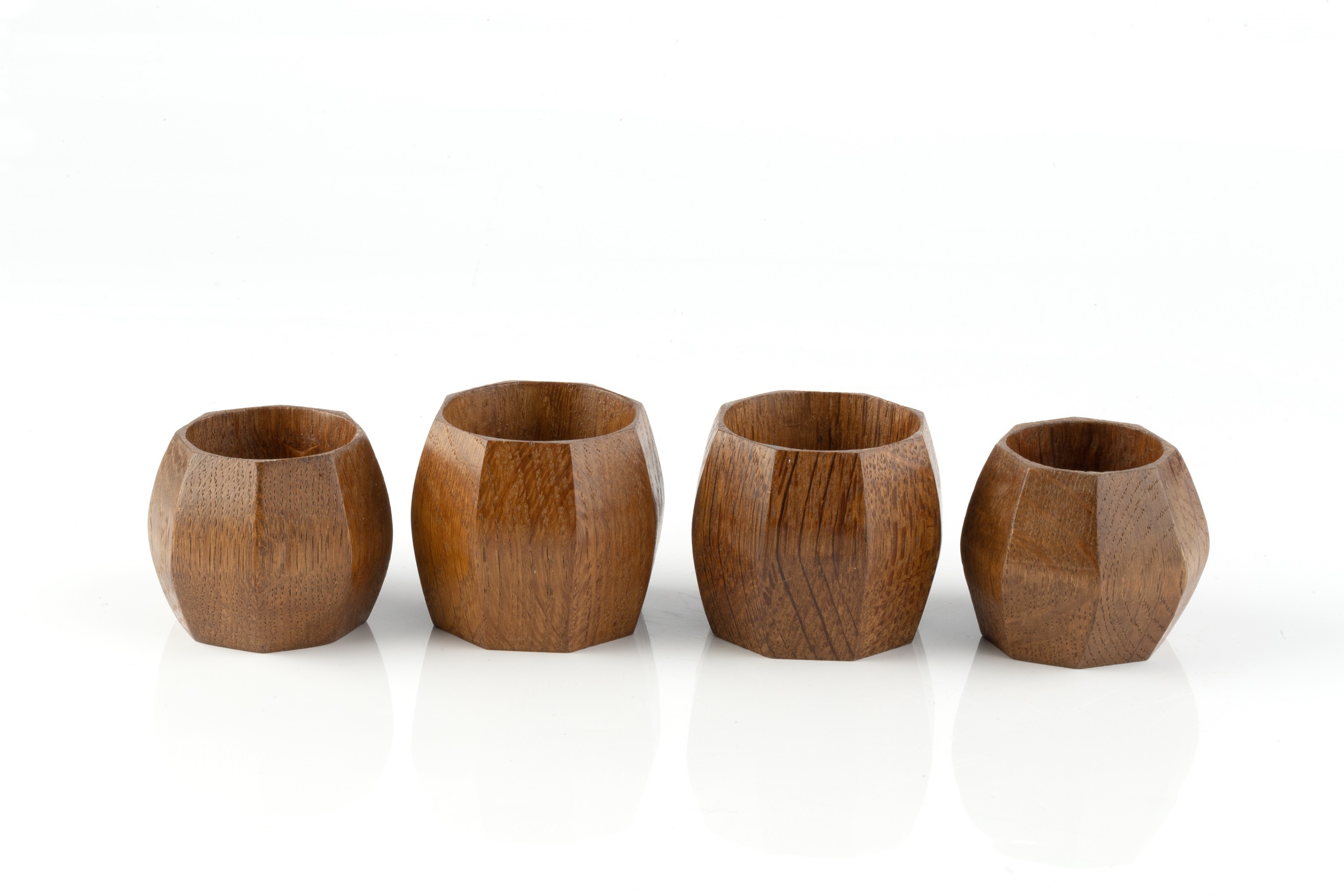 Robert Thompson of Kilburn (1876-1955) A set of four Mouseman napkin rings, circa 1970 oak carved - Image 3 of 3