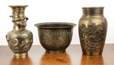 Three pieces of brassware 20th Century, a Chinese vase decorated with a dragon, 25cm high, another