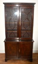 Burr oak and pine two-part bookcase 19th Century, with astragal glazed doors, 98cm wide x 48cm