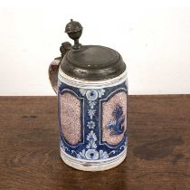 Faience tankard with a pewter cover German, 18th Century, decorated with blue and white flowers