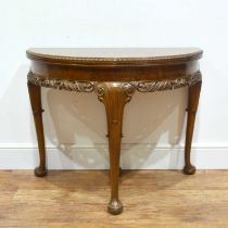 1930s burr walnut half-round fold over top card table with carved decoration, 96cm wide x 50cm