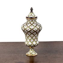 Porcelain urn vase and cover French, with Sevres mark to the base, decorated with green leaves and
