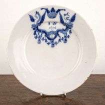 Delftware blue and white tin-glazed plate 17th/18th Century, painted with cartouche, griffins to