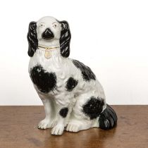 Staffordshire spaniel 19th Century, black and white colourway, with gilt painted collar, unmarked,