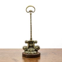 Heavy brass doorstop late 19th Century, on a weighted base, 38cm high With marks commensurate with