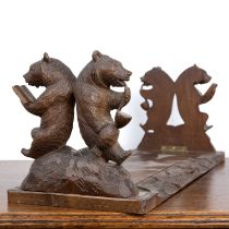 Black Forest carved bookends with carved decoration of bears and trees, external measurement is 44cm