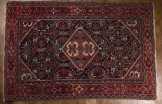 Hamadan rug navy ground, decorated with a central medallion, the central medallion surrounded by