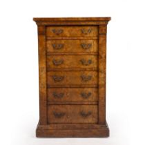A Victorian burr walnut Wellington chest with six drawers and a plinth base 56cm wide 35cm deep 91cm