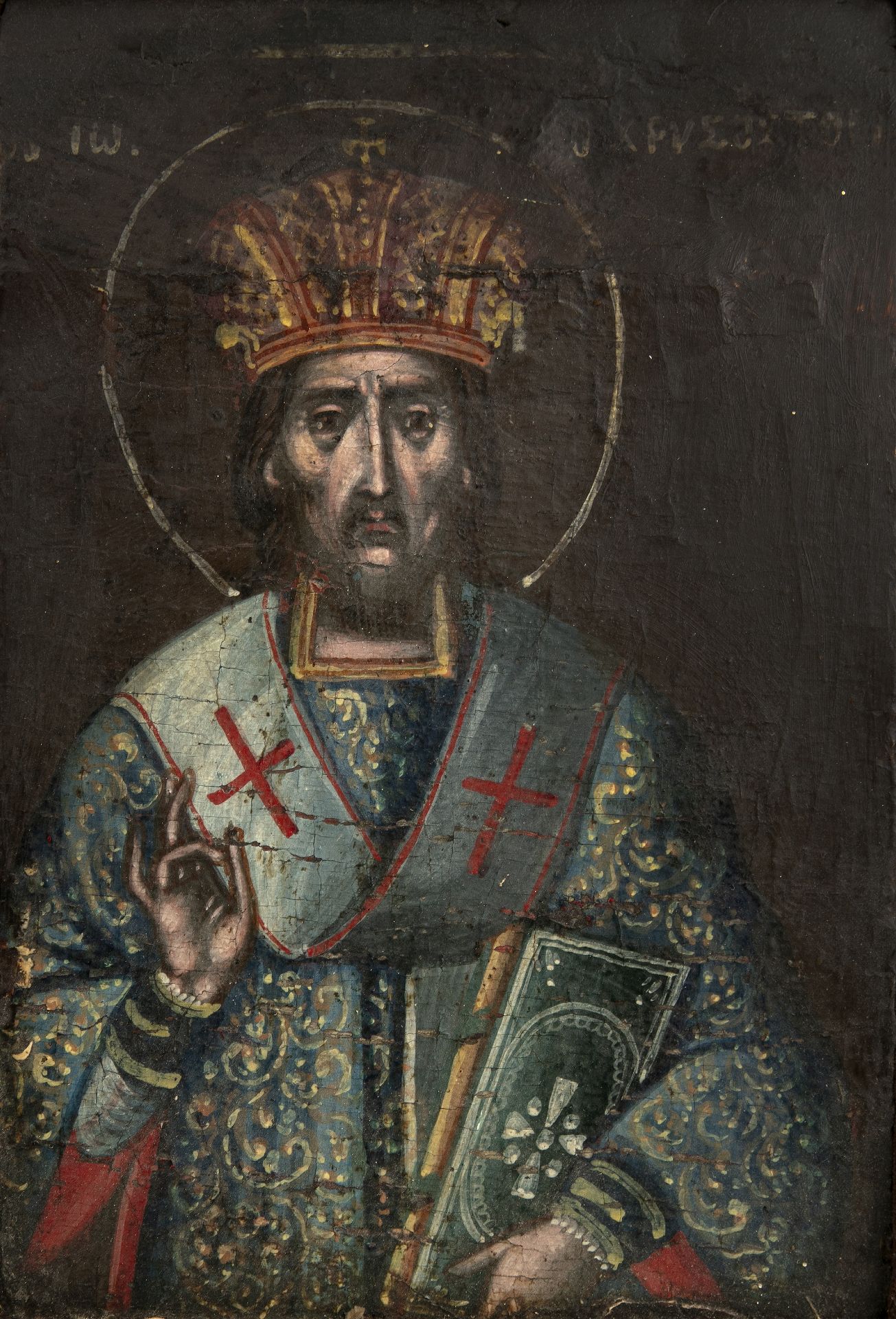 An 18th century eastern European oil on panel depicting a priest 19cm x 13cm