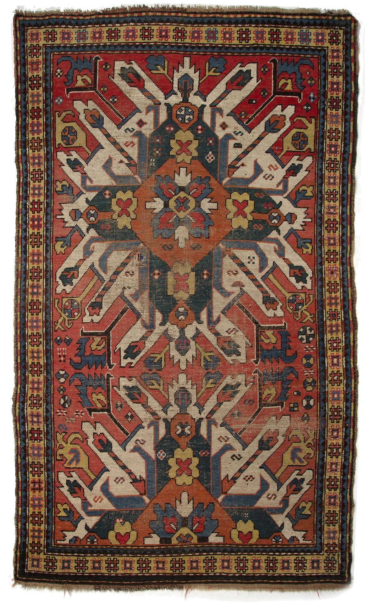 An early 20th century star Kazak rug with polychrome decoration and a banded border 130cm x 215cm