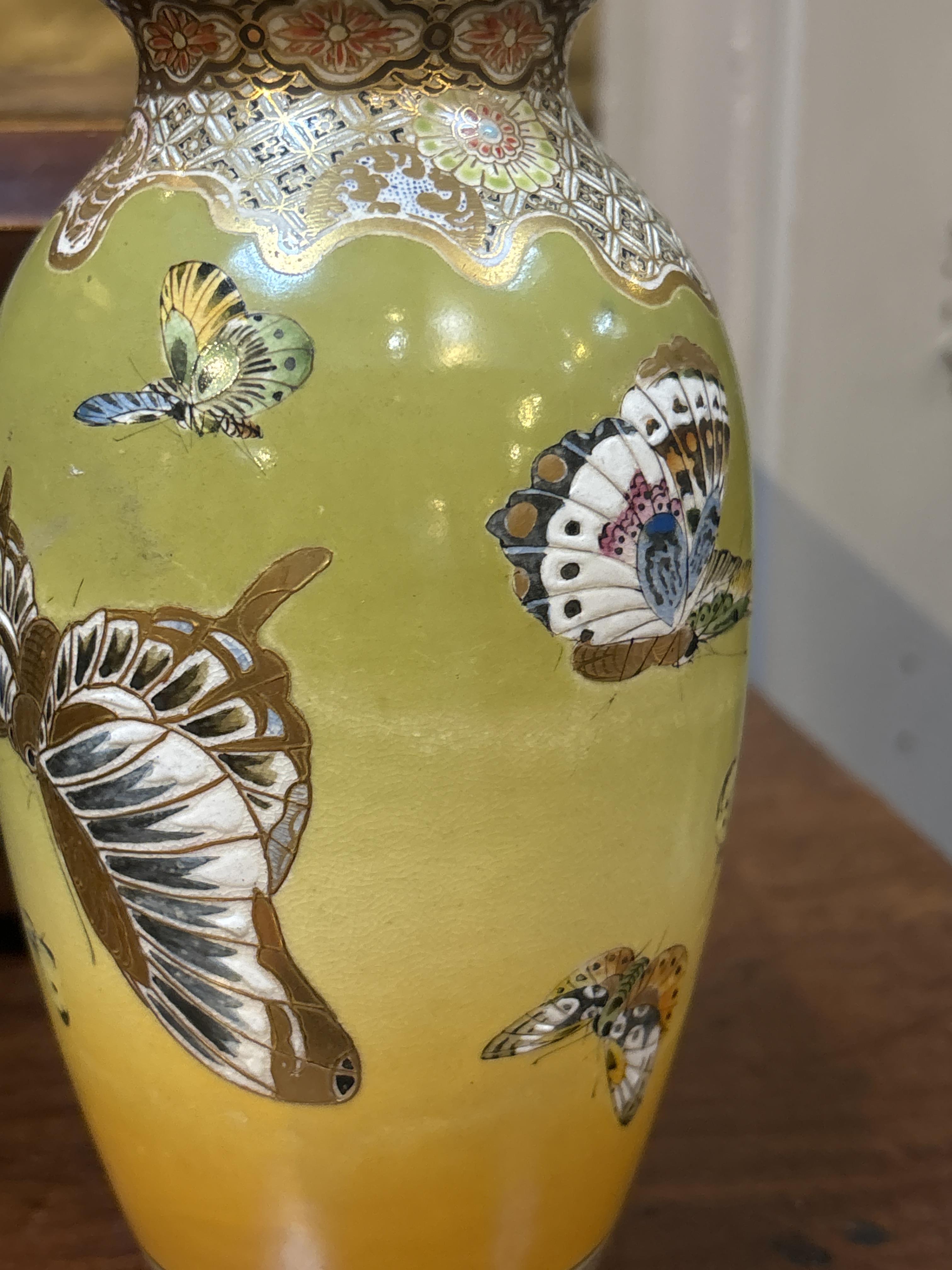 A pair of Japanese Meiji Satsuma porcelain vases decorated with butterflies and moths, with - Image 8 of 11