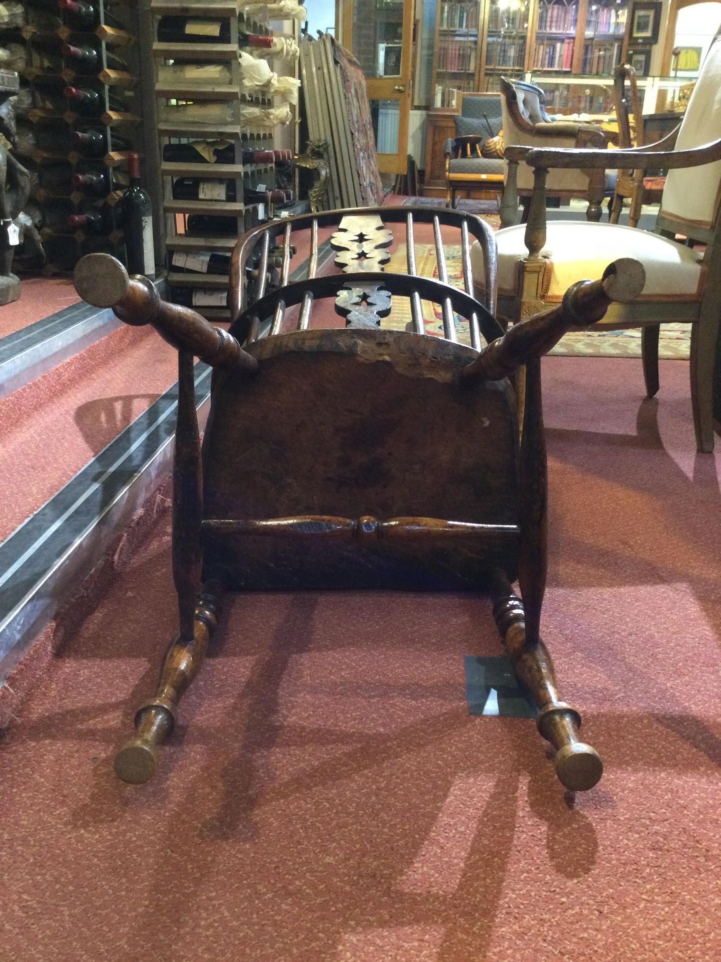 A 19th century ash and elm spindle back Windsor armchair with a pierced splat and turned supports, - Bild 10 aus 15