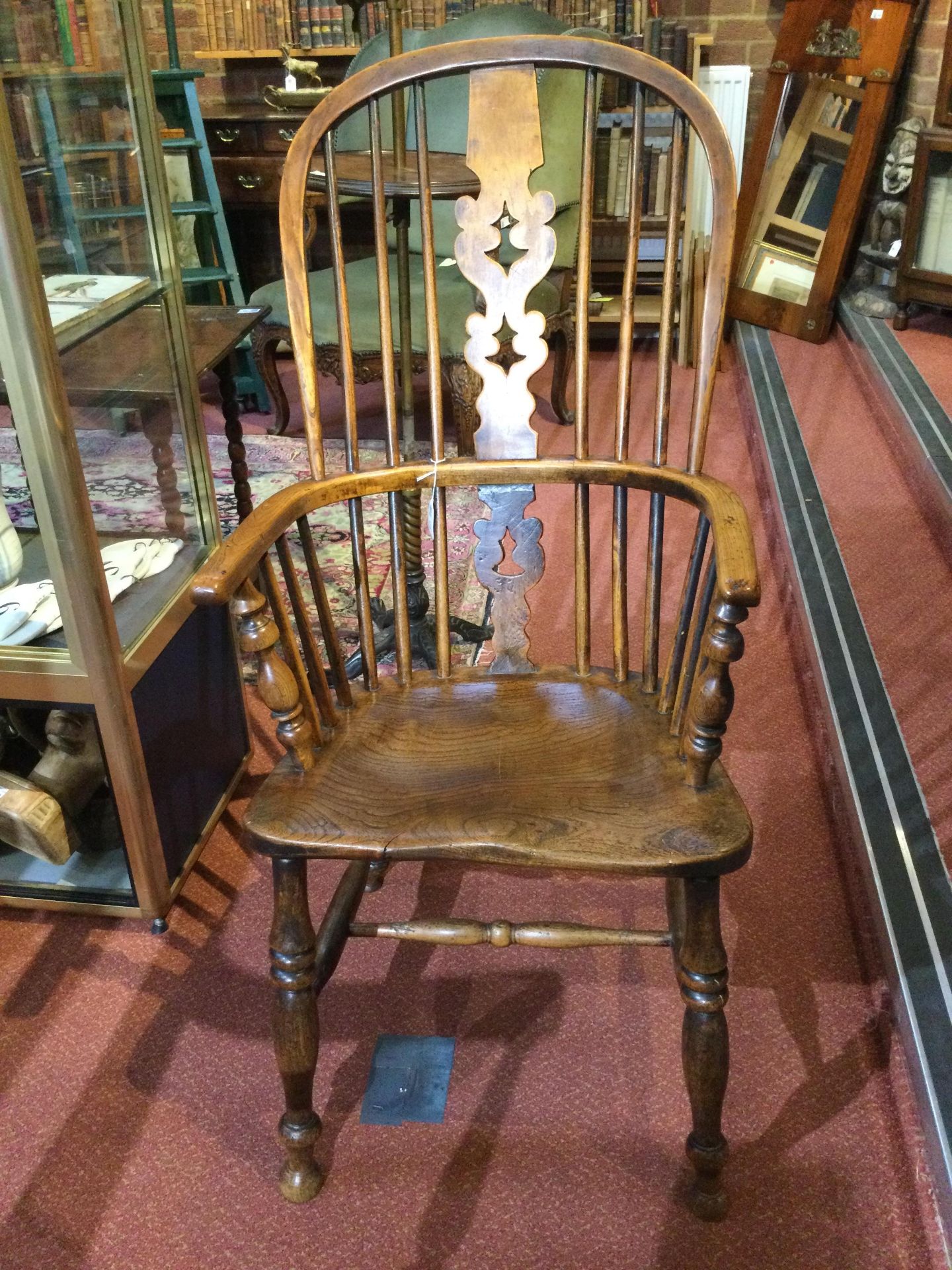 A 19th century ash and elm spindle back Windsor armchair with a pierced splat and turned supports, - Bild 8 aus 15