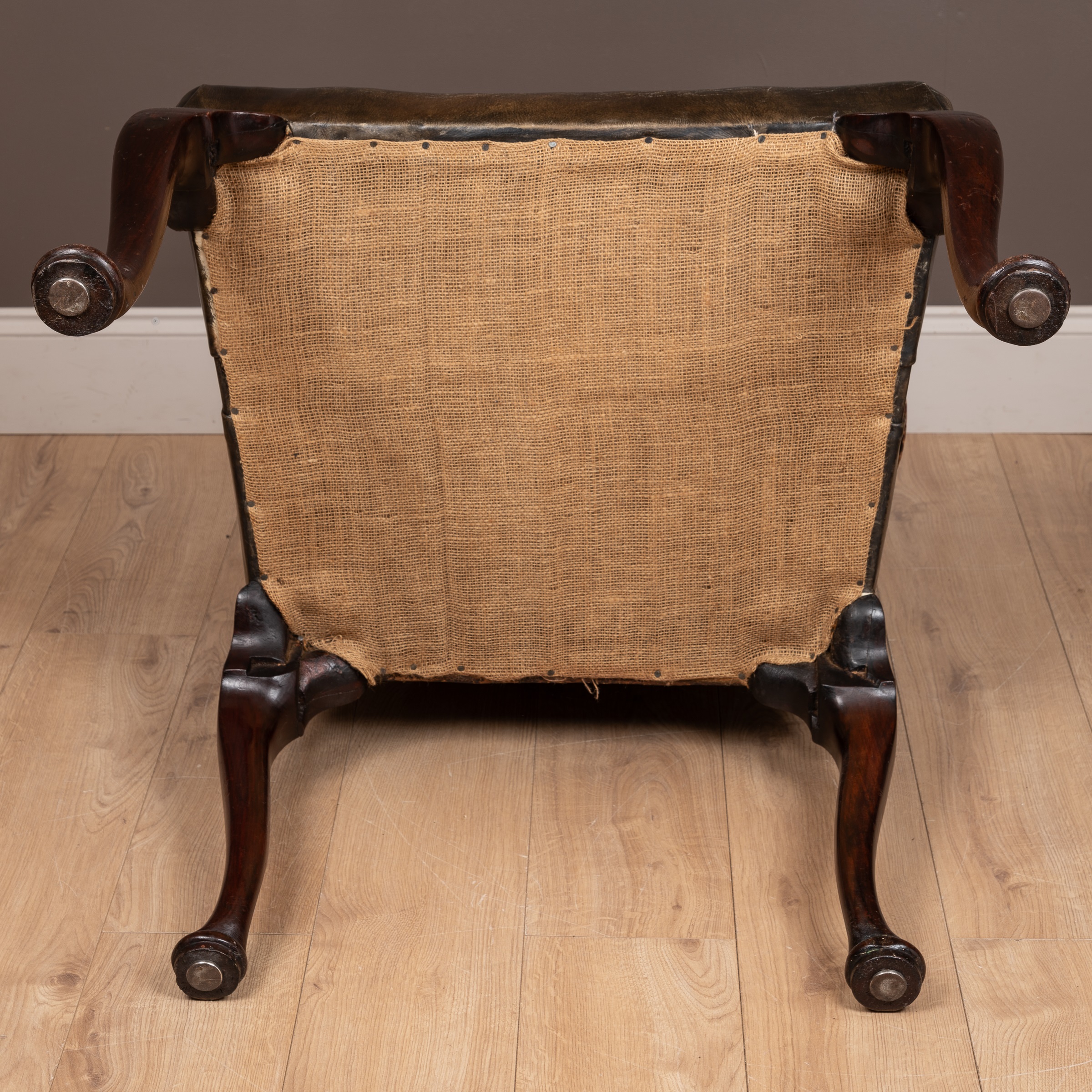 A George III mahogany framed leather upholstered library chair with a shaped back, scrolling arm - Image 9 of 9