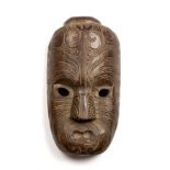 A 20th century southsea islands, possibly Maori mask, 18cm wide 33cm high