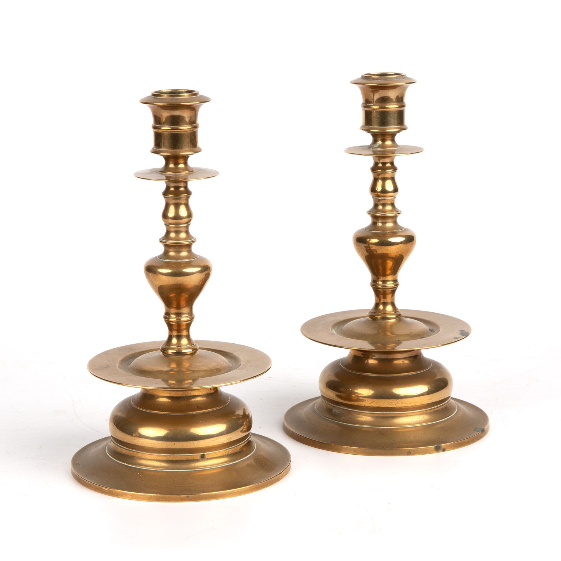 A pair of 20th century Swediah Skultuna brass 1611 no 58 candlesticks 12cm diameter 20cm high. Good