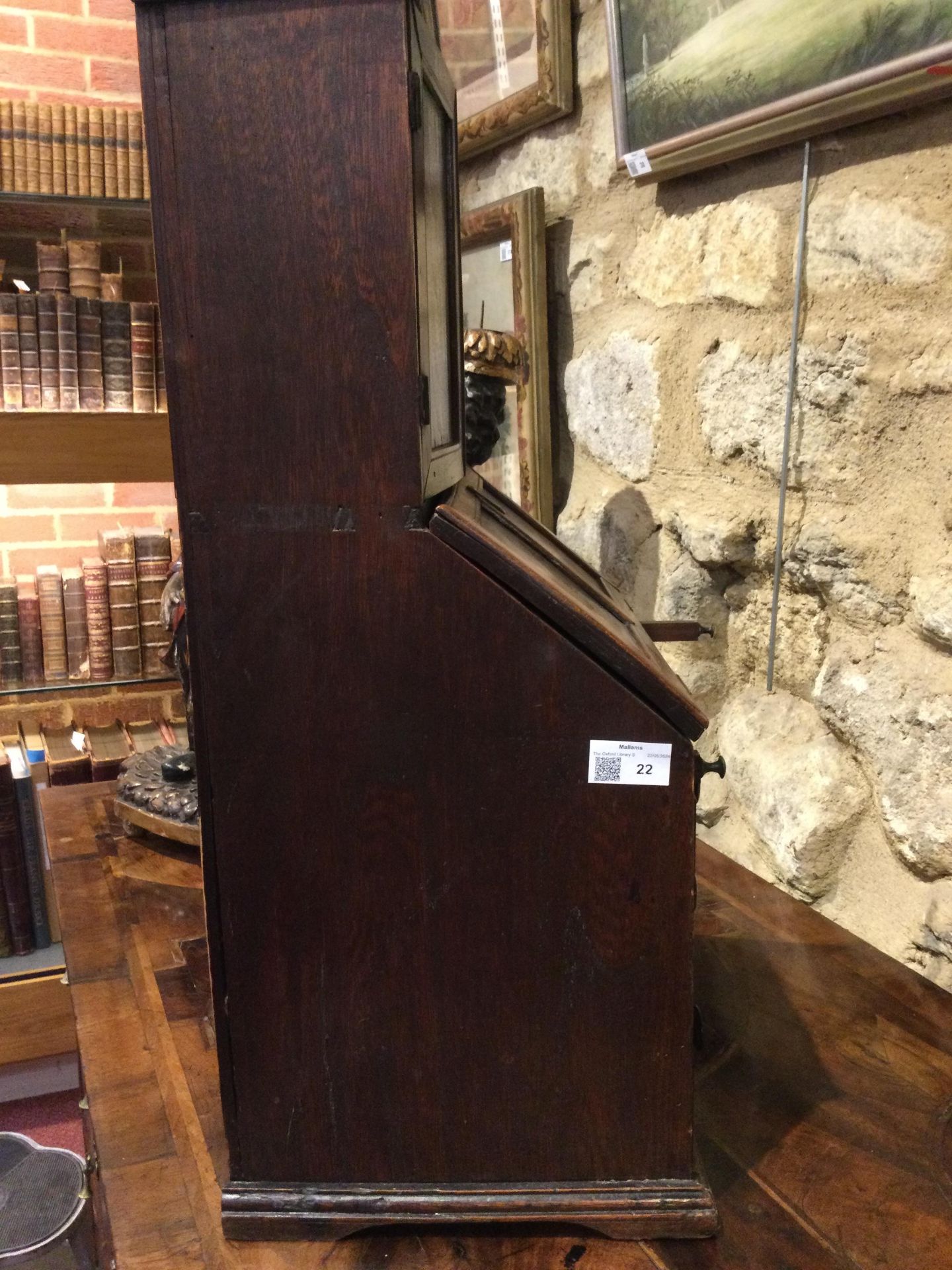 An 18th century elm apprentice bureau bookcase with panelled doors above a fall front three - Image 17 of 26
