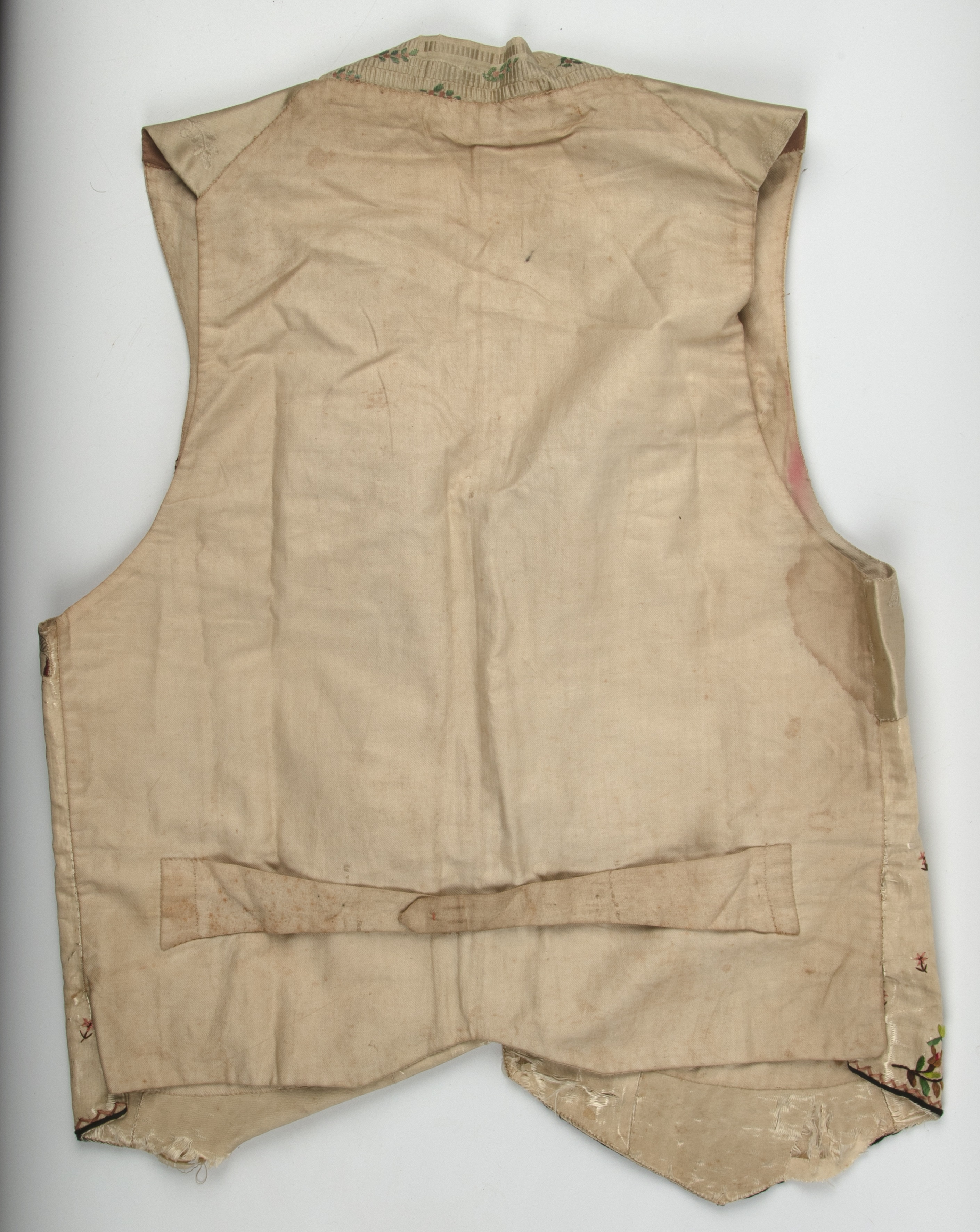 A Georgian silk embroidered waistcoat, decorated with flowers. Stains, marks.  Fraying around button - Image 2 of 24