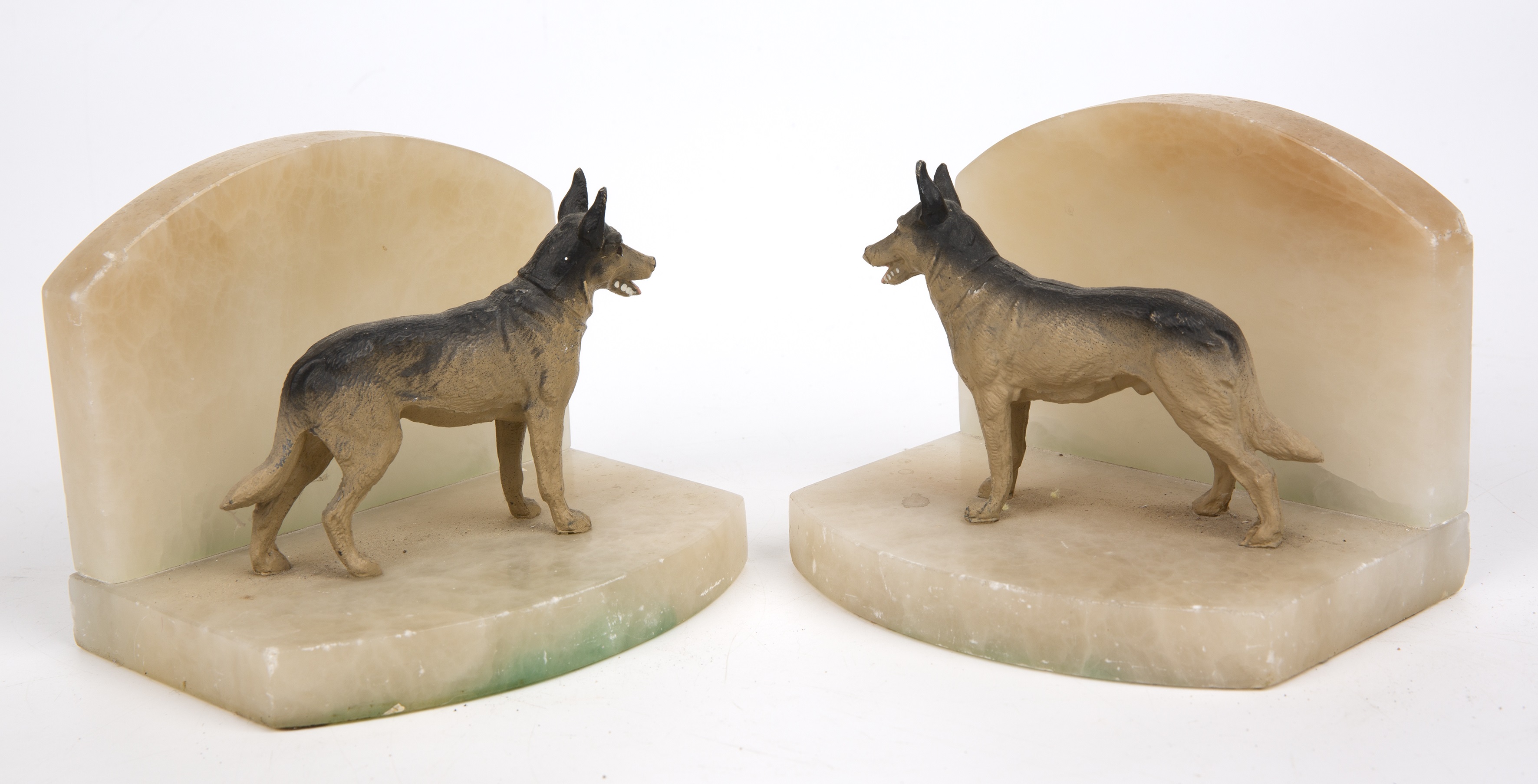A pair of alabaster and spelter book ends in the form of German shepherd dogs each 15cm wide - Image 2 of 4