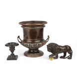 A 19th century grand tour bronze urn 10cm wide 11cm high together with a bronzed spelter lion 18cm
