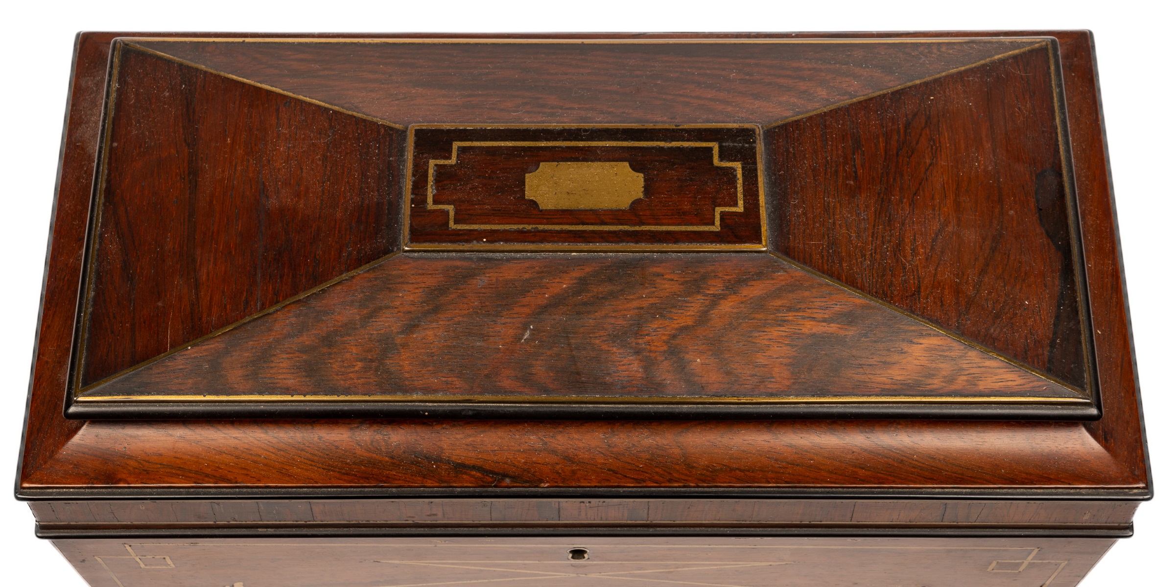 A Regency tea caddy of sarcophagus form on brass paw feet, the top opening to reveal a fitted - Image 6 of 6
