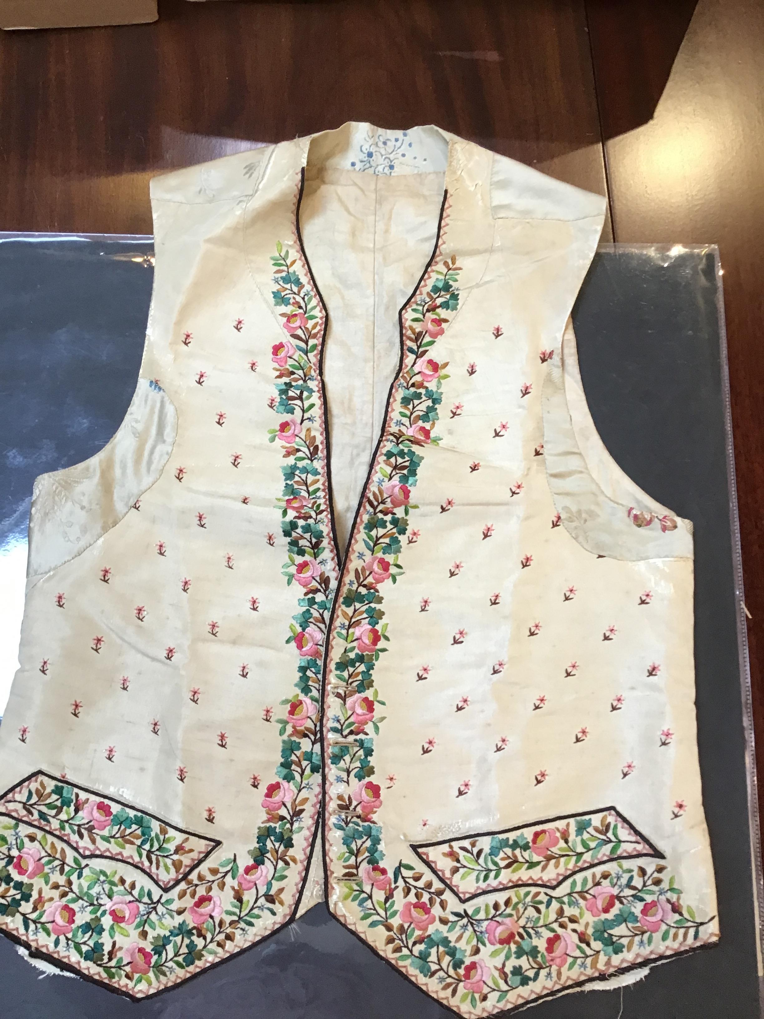 A Georgian silk embroidered waistcoat, decorated with flowers. Stains, marks.  Fraying around button - Image 24 of 24