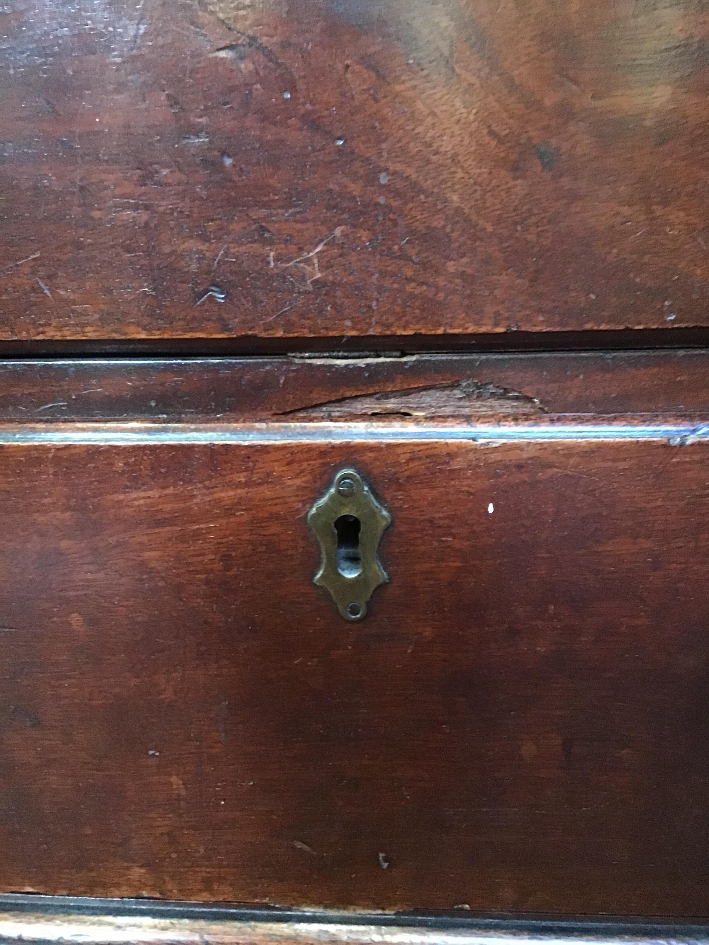 A George III mahogany chest of four long drawers having brass swan neck handles, a brushing slide - Image 9 of 31