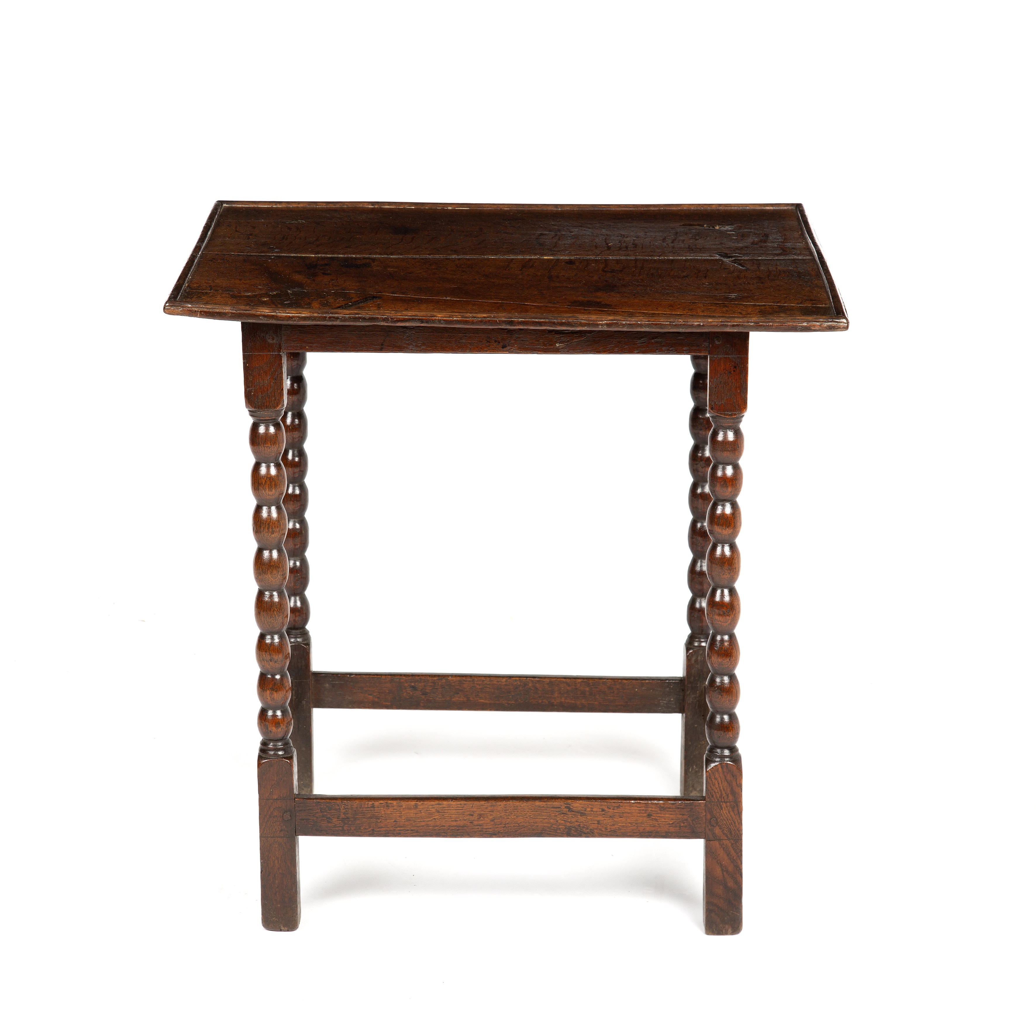 A Queen Anne oak table, with turned supports united by stretchers circa 1710, 61cm wide 41cm deep - Image 2 of 3