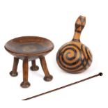 A 19th century African Zulu stick 90cm together with a 19th century African tribal stool 25cm wide