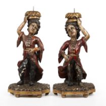 A pair of 18th/19th century Italian carved and polychromed wood figures 24cm wide 53cm high
