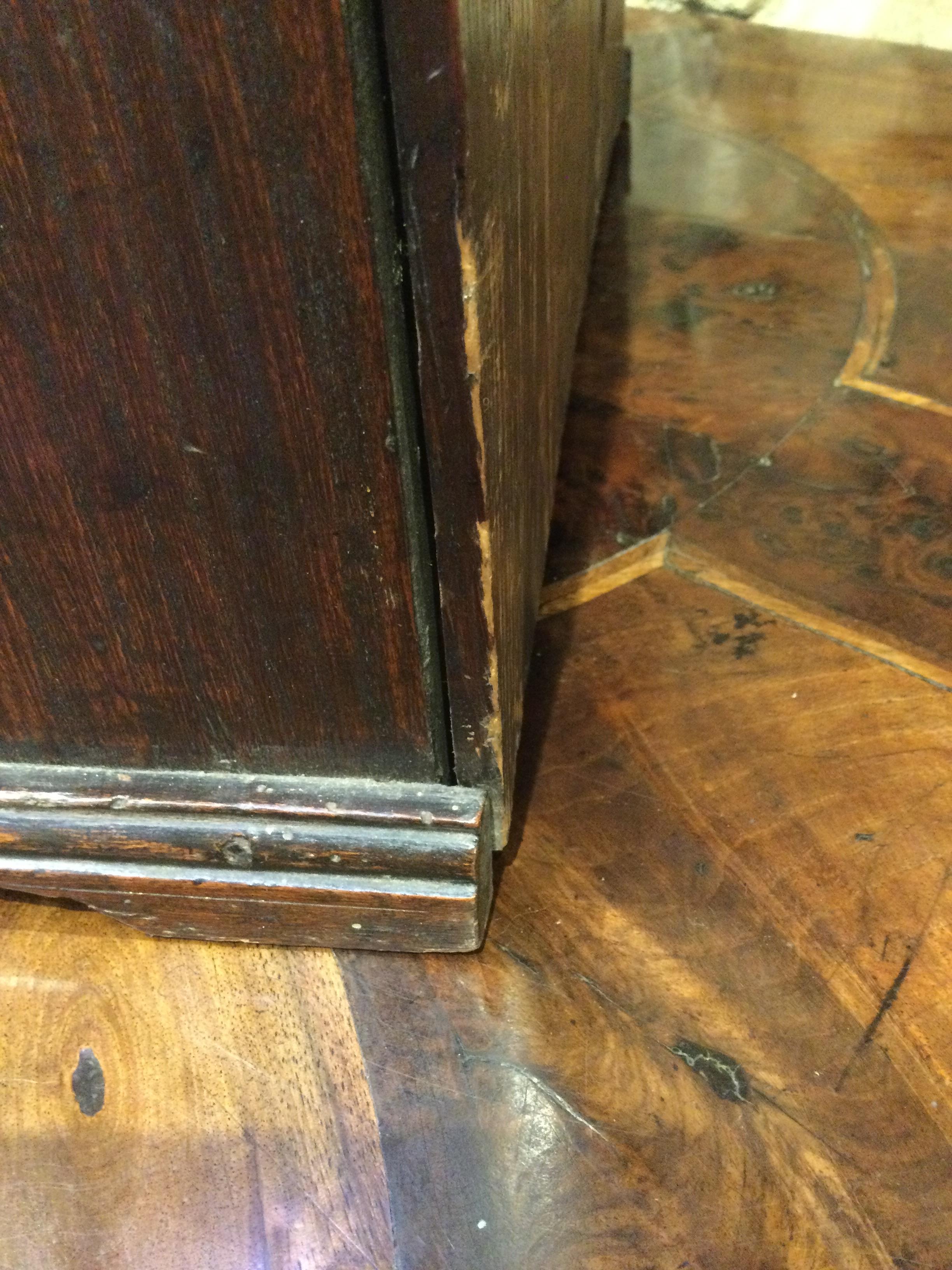 An 18th century elm apprentice bureau bookcase with panelled doors above a fall front three - Image 24 of 26