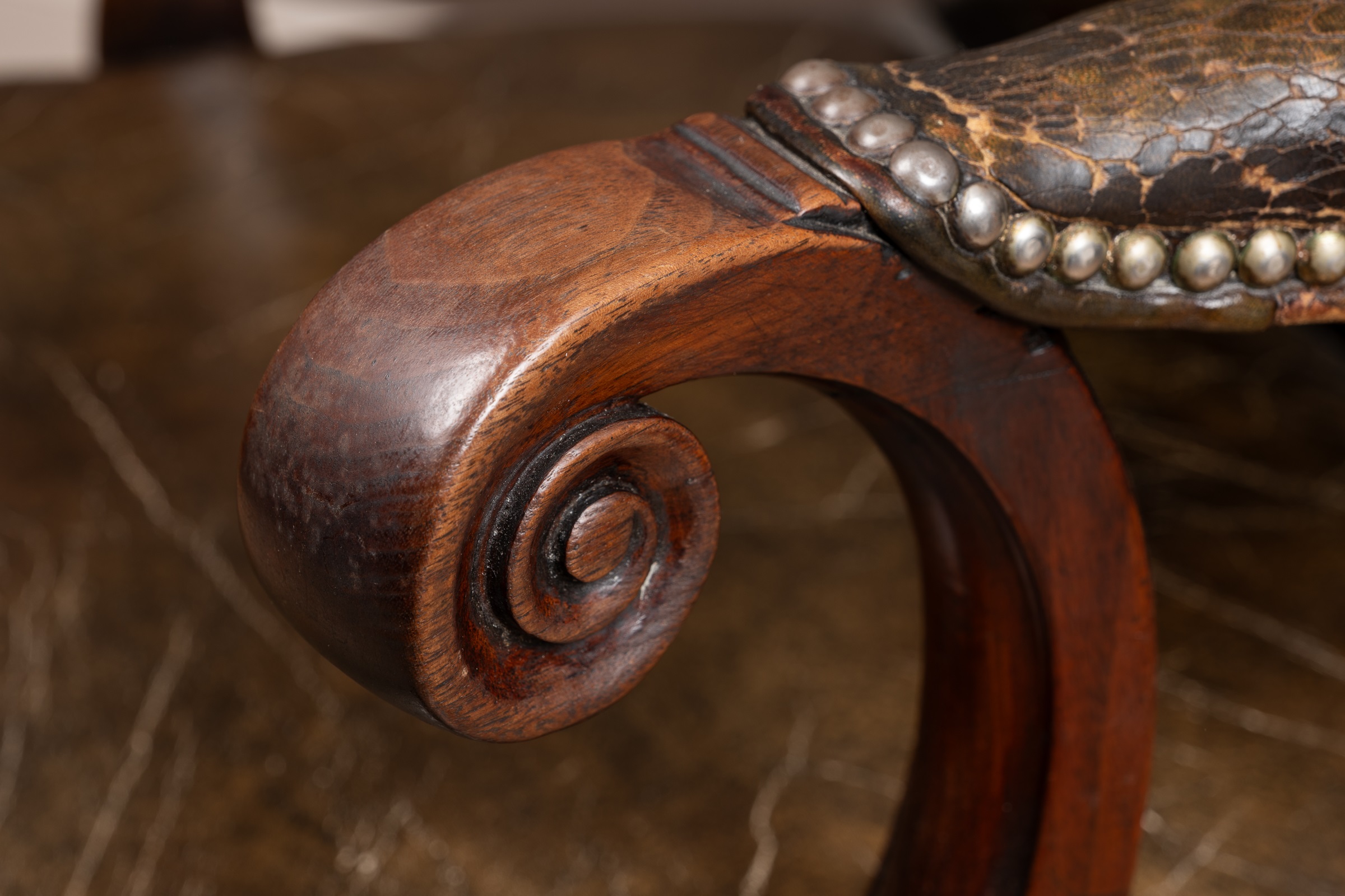 A George III mahogany framed leather upholstered library chair with a shaped back, scrolling arm - Image 5 of 9