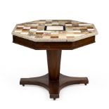 A late 20th century specimen marble octagonal topped centre table with a mahogany base, 90cm wide